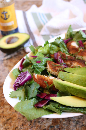 Blackened Tilapia Salad | Inspired by fish tacos, this salad swaps the tortilla with healthy greens for a low carb, paleo friendly dish. | eatsomethingdelicious.com