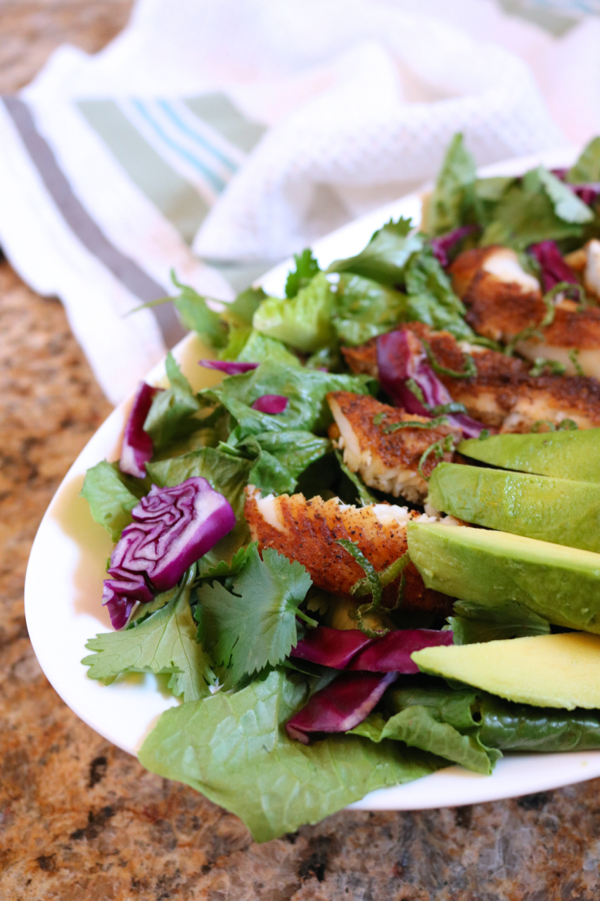 Blackened Tilapia Salad | Inspired by fish tacos, this salad swaps the tortilla with healthy greens for a low carb, paleo friendly dish. | eatsomethingdelicious.com