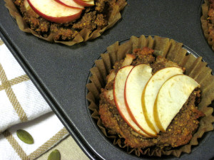Spiced Apple Muffins | Paleo spiced apple muffins made from pumpkin seed flour with mahlab added for a unique flavor. Try them topped with coconut oil or butter. | eatsomethingdelicious.com