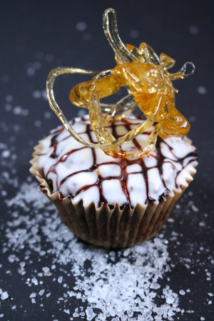 Salted Caramel Cupcakes | These paleo salted caramel cupcakes have a soft, airy texture without being overly sweet. Try your hand a sugar art for a fun decoration too! | eatsomethingdelicious.com