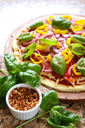 Paleo Sicilian Pizza | Pepperoni, salami, banana peppers, red onion, and fresh basil on a thin crust pizza made from my multi-purpose dough. Includes a dairy free option. | eatsomethingdelicious.com