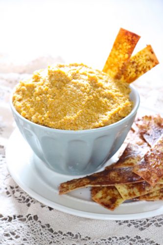 Pumpkin pie cheesecake dip is served with simple cinnamon chips made from lasagna sheets which mimic a pie crust. Perfect for fall parties | eatsomethingdelicious.com