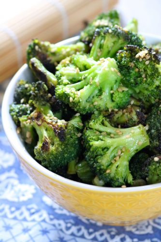 Sesame Ginger Broccoli | Paleo and vegan friendly broccoli sautéed with coconut aminos, garlic, and ginger then garnished with sesame seeds. Serve as a side or with meat for a meal. | eatsomethingdelicious.com