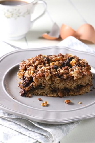Cinnamon Raisin Coffee Cake | Cinnamon sugar, raisins, and pecans are baked between layers of soft vanilla bean spice cake. Only gluten free and paleo ingredients are used. | eatsomethingdelicious.com