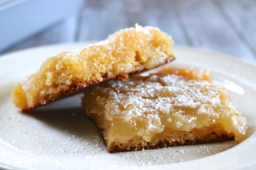 Dairy Free Gooey Butter Cake | A classic St. Louis dessert made dairy free and gluten free. Yellow cake is covered in a sweet and creamy "gooey" layer with a perfectly flaky top. | eatsomethingdelicious.com