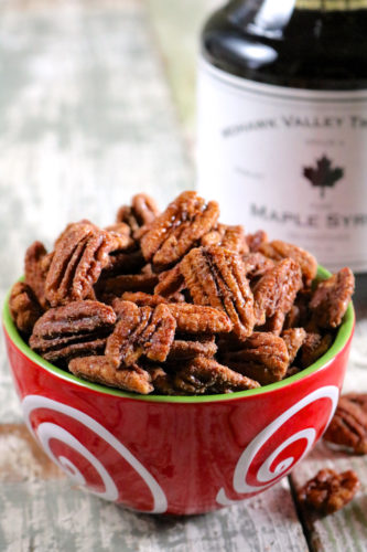 15 Minute Maple Cinnamon Candied Pecans | 3 ingredients and 15 minutes is all you need to make these maple cinnamon candied pecans. Try them as an ice cream topping. Gluten free, vegan, and paleo. | eatsomethingdelicious.com