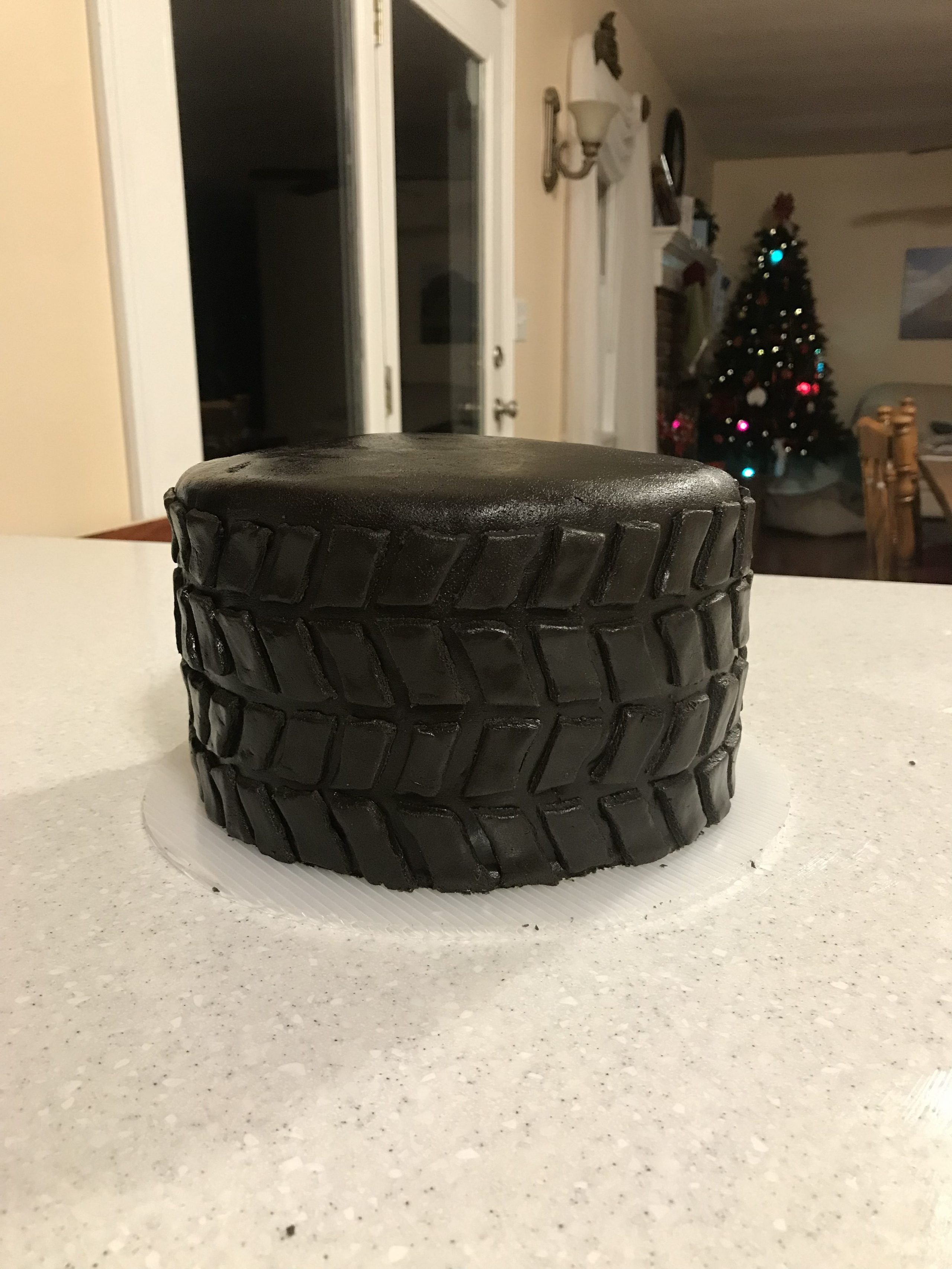 Allen's Tire Birthday Cake | Learn how to decorate a cake using only gluten free ingredients. I made this vanilla cake decorated in a tire tread pattern for my son's first birthday. | eatsomethingdelicious.com