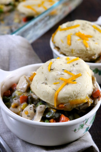 Creamy Chicken and Biscuits Casserole | A gluten free, dairy free version of creamy chicken and biscuits. A creamy, cheesy mixture of chicken, veggies, and corn are topped with bisuits and baked. | eatsomethingdelicious.com
