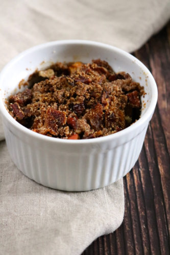Bacon Apple Crisp | Spiced apples with a crunchy topping, including extra crispy bacon, served in their own individual ramekins. Gluten free, dairy free, and paleo friendly. | eatsomethingdelicious.com