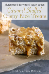 Caramel Stuffed Crispy Rice Treats | Easy crispy rice treats stuffed with a layer of runny caramel. You'll never believe they're free from dairy and gluten. Recipe includes a vegan option too. | eatsomethingdelicious.com