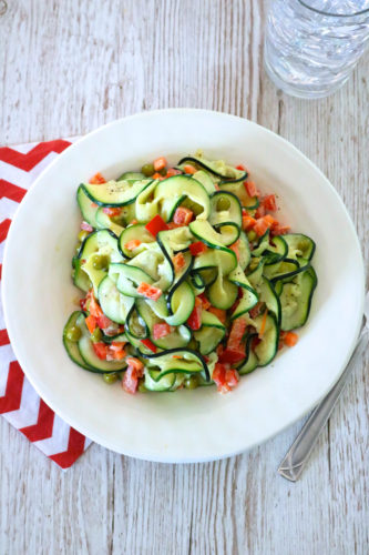 Less Pasta, More Salad | Pasta salad made with zoodles (spiralized zucchini) instead of noodles. Tossed in a mayo-mustard dressing for a change from the traditional vinaigrettes. | eatsomethingdelicious.com